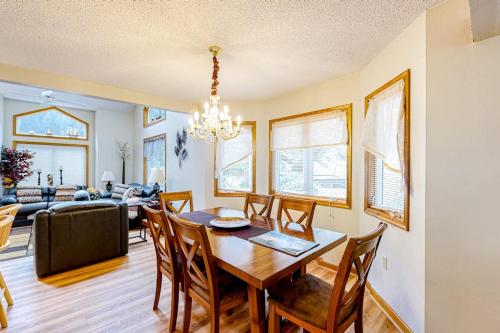 a dining room and living room with a table and chairs at Ocean Pines Fairway in Ocean Pines