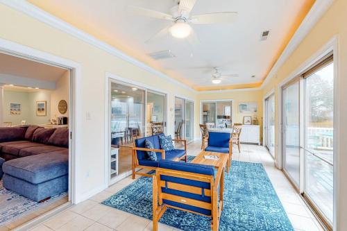 a living room with a couch and a table at Turtle Shores in Ocean Pines