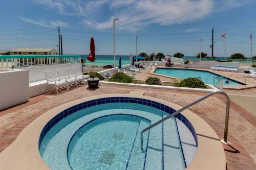Beautiful resort condo with a shared pool hot tub tennis gym & beach access photo 4