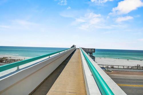 Beautiful resort condo with a shared pool hot tub tennis gym & beach access photo 24