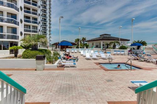Beautiful resort condo with a shared pool hot tub tennis gym & beach access photo 33