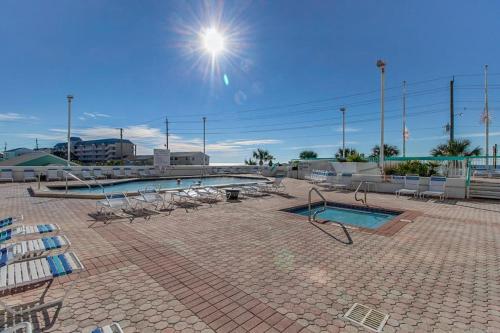 Beautiful resort condo with a shared pool hot tub tennis gym & beach access photo 34
