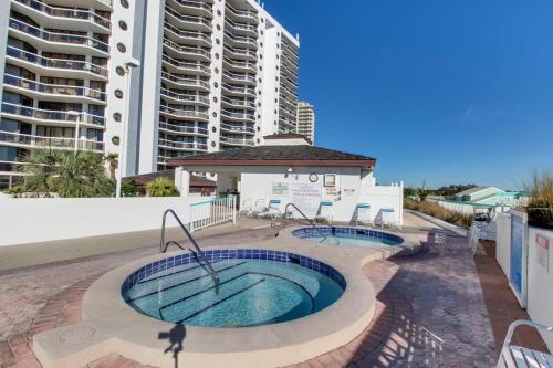 Beautiful resort condo with a shared pool hot tub tennis gym & beach access photo 39