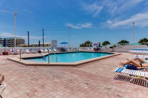 Beautiful resort condo with a shared pool hot tub tennis gym & beach access photo 40