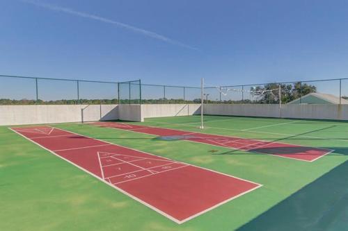 Beautiful resort condo with a shared pool hot tub tennis gym & beach access photo 42