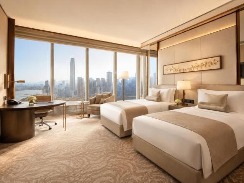 a hotel room with two beds and a desk at Hotel Platinum Square in New Delhi