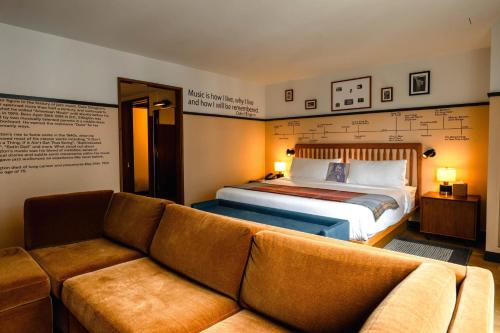 a hotel room with a bed and a couch at Eaton DC in Washington, D.C.