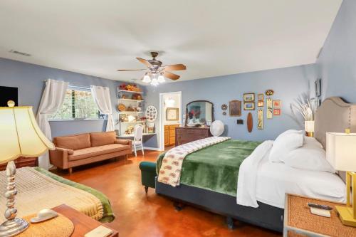 a bedroom with a bed and a living room at Three Horses Ranch in Johnson City