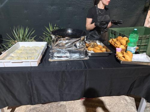 a table with two trays of food on it at Casolare Lodedo in Ceglie Messapica