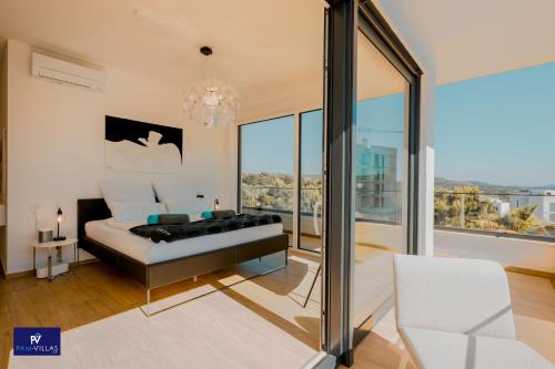 a bedroom with a bed and a large window at Primosten Hills West - Branded Luxury Villa in Primošten