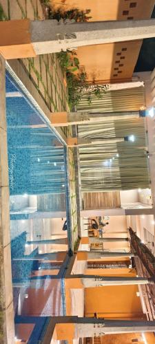 an overhead view of a staircase in a building at Villa Saffron Luxury Pvt Pool in Pondicherry
