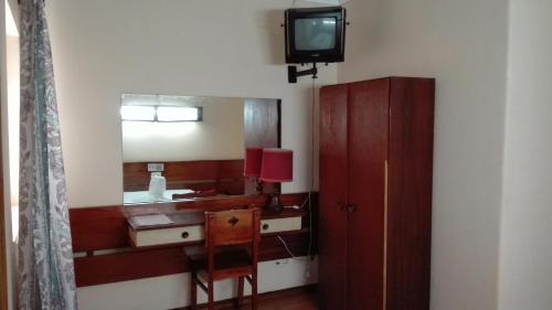 TV a/nebo společenská místnost v ubytování Residencial Sol