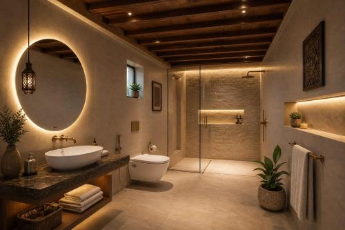 a bathroom with a sink and a shower at Sunrise Resort Jaislamer in Jaisalmer