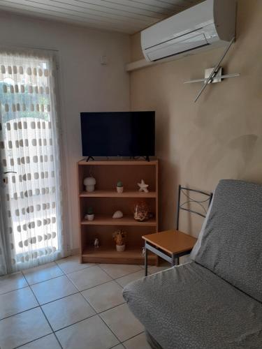 Studio en rez de jardin
