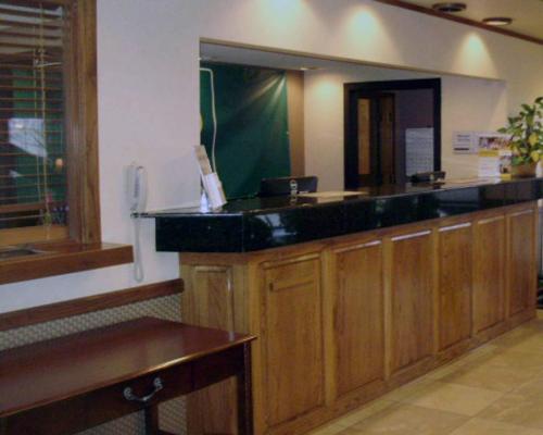 a kitchen with a counter with a sink and a window at Quality Inn & Suites Searcy I-57 in Searcy