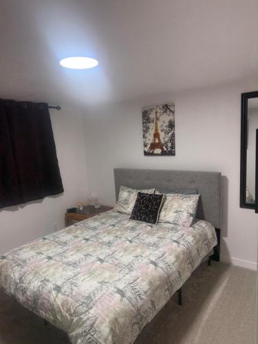 a bedroom with a bed with a pillow on it at Anthony's Home in Spokane