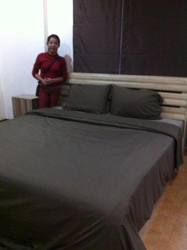 Cama o camas de una habitación en Janson's House Next to Singha Park Chiang Rai