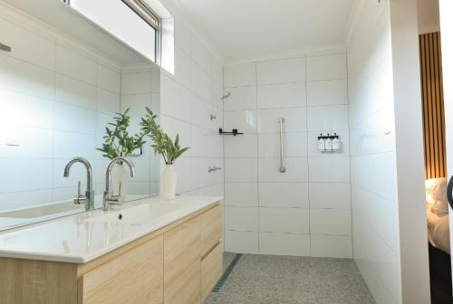 a bathroom with a sink and a shower at Sea Lake Motel-24 Hour Check-In Private Ensuite Rooms in Sea Lake