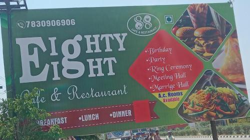 a sign for a restaurant with food on it at Eighty eight restaurant and cafe in Muzaffarnagar