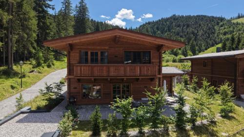 an aerial view of a house in the mountains at Sissi green Chalets in Seefeld in Tirol