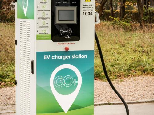 a hydrogen fueling machine with an ev charger station at ibis Styles Kraków East in Krakow