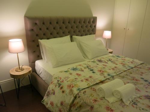 Postel nebo postele na pokoji v ubytování Chateau Flores