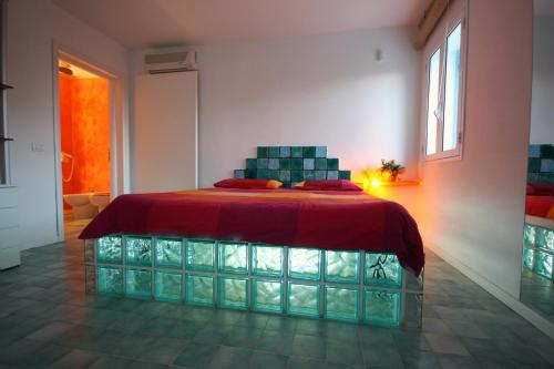 Suite House L'Isola Che Non C'èにあるベッド