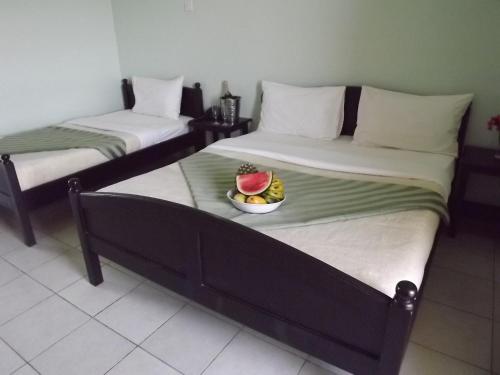 Un pat sau paturi într-o cameră la South Beach Resort