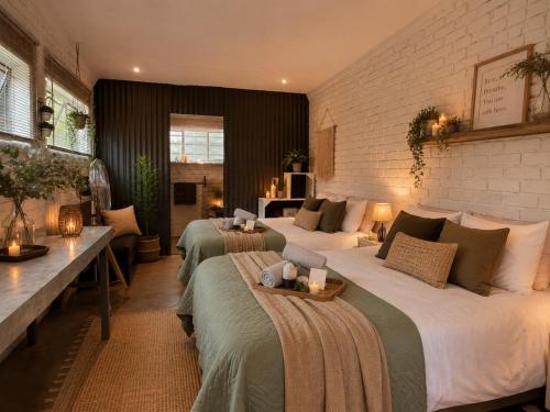 a hotel room with two beds in a room at De Haven Oost in Rayton