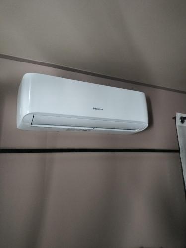 a wall mounted air conditioner on a wall at La Trimouillaise in La Trimouille