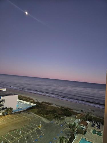 a view of the beach from the balcony of a resort at Oceanview Room at Landmark Resort in Myrtle Beach