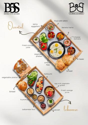 a plate with different types of food on it at Prime Residence Zayed Heights in Sheikh Zayed