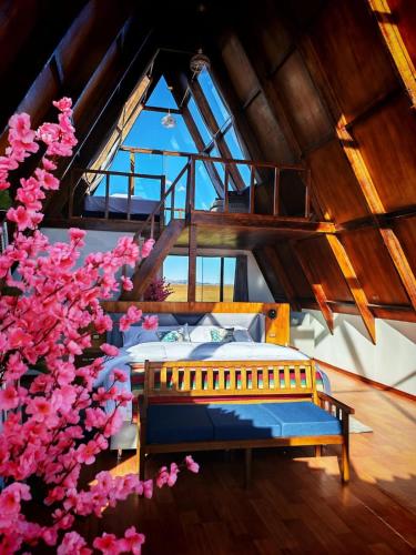 a bedroom with a bed in a room at Titicaca wasy lodge in Puno