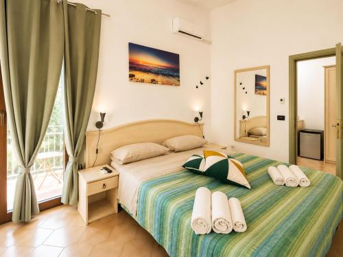 a bedroom with a bed and a window at Bed and Breakfast Station in Brindisi