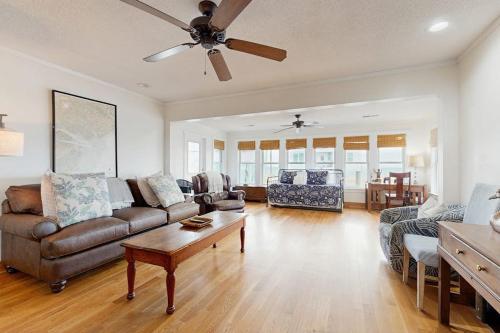 a living room with a couch and a table at The Answer in Edisto Island