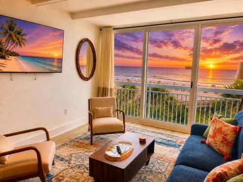 a living room with a view of the ocean at Renovated Oceanfront 1BR by Skywheel Yachtsman 400 in Myrtle Beach