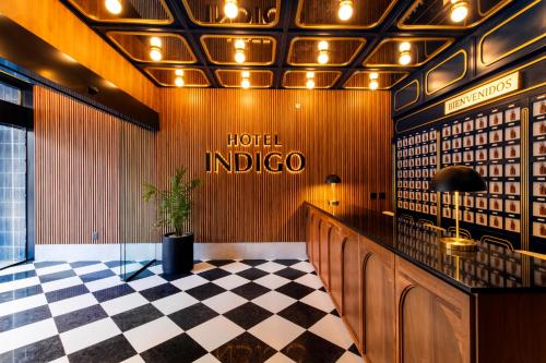 a hotel indigo lobby with a checkered floor at Hotel Indigo Tijuana Downtown by IHG in Tijuana