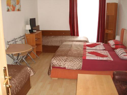 Postel nebo postele na pokoji v ubytování Pension Easy Journey