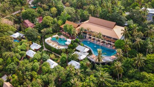 an aerial view of a house with a swimming pool at Tanote Villa resort, Koh-Tao in Ko Tao