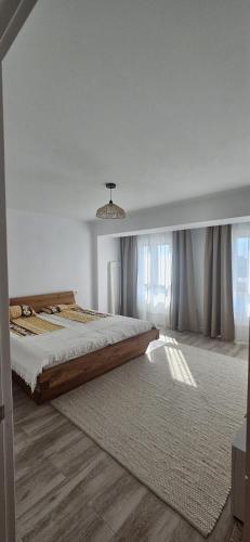 a bedroom with a large bed and a rug at Benning Haus Gandia in Gandía