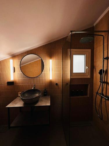 a bathroom with a sink and a mirror at Tproject in Preveza