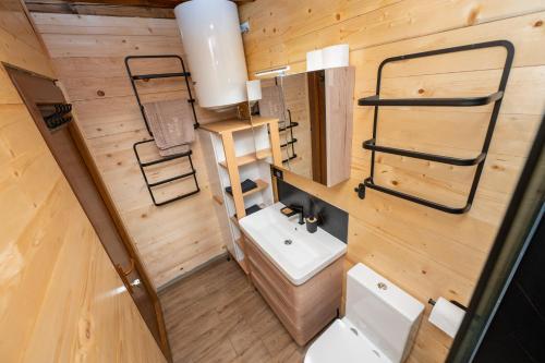 an overhead view of a bathroom with a toilet and sink at Brvnara Iva Kolašin Crna Gora in Selišta