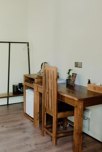 an office with a wooden desk and a chair at The Spice Trail, Ahangama in Ahangama