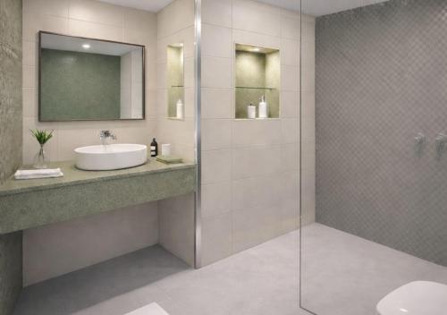a bathroom with a sink and a shower at Kaani Haven Beach in Ukulhas