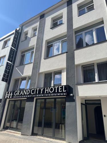 a building with a sign that reads grand city hotel at HI Grand City Hotel in Hannover
