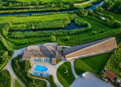 an overhead view of a building with a tennis court at Danube Delta View in Dunavăţu de Jos