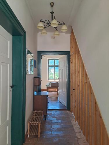a hallway with a stairway leading to a room at Oben im Selketal Parterre in Harzgerode
