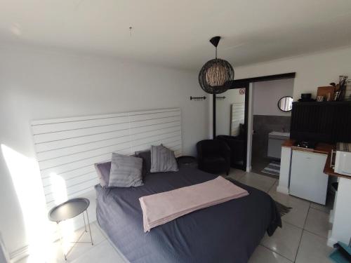 a bedroom with a large bed in a room at 284 on circular 3 in Sunridge Park