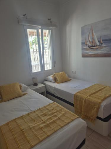 Mediterranean Beach Retreat Spacious 2 Bedroom Home with Patio and Sea Views