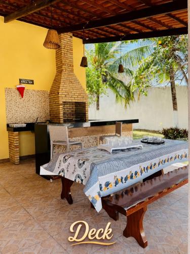 a dining room with a table and a tableablish at Paracuru Praia in Paracuru